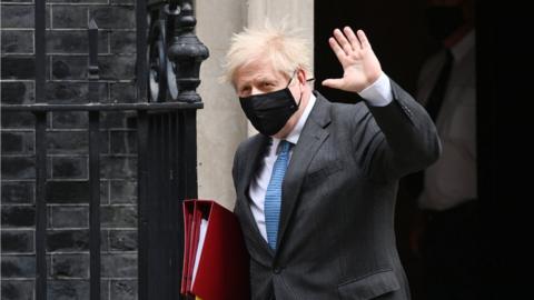 Boris Johnson leaving Downing Street for PMQs