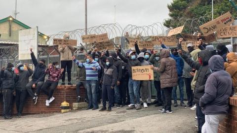 About 40 people took part in the protest outside the camp