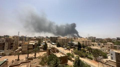 Smokes rise after clashes erupted in the Sudanese capital Khartoum