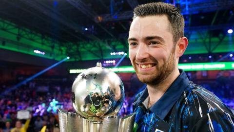 Luke Humphries with the Sid Waddell Trophy after winning the PDC World Darts Championship
