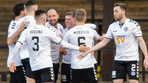 Michael Moffat (centre) celebrates his goal with his Ayr United team-mates