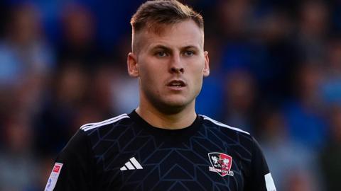 James Scott in action for Exeter City