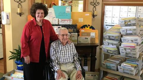 Joe and his daughter Beverly Cuba surrounded by his birthday cards