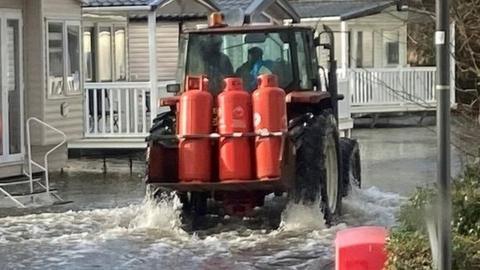 Tractor in floods at Kiln Park