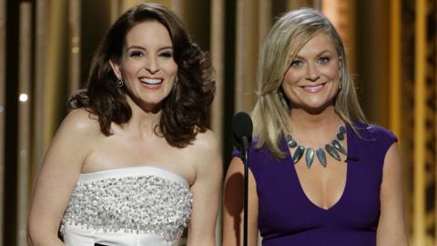 Tina Fey and Amy Poehler hosting the Golden Globes in 2015