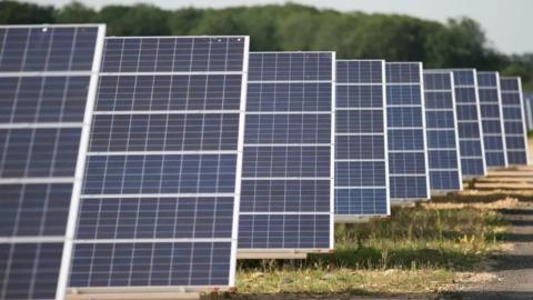 Photo of a line of solar panels