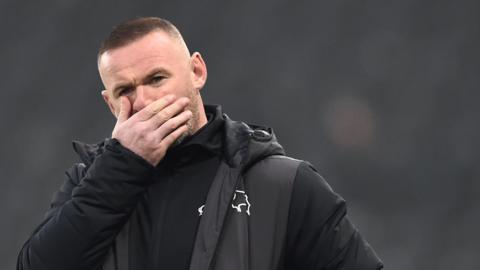 Wayne Rooney on the sideline as caretaker Derby manager