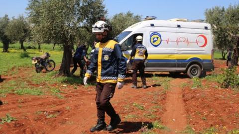 White Helmets first responders at the site of a suspected drone strike in Idlib province, Syria, that killed a man (3 April 2023)
