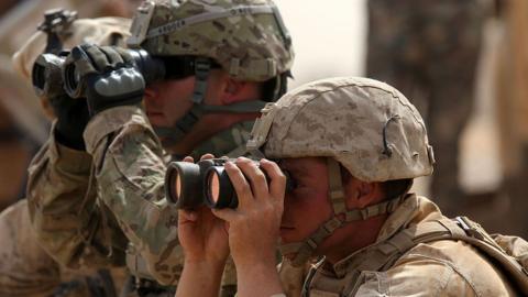 Two soldiers participate in a Jordanian joint military exercise