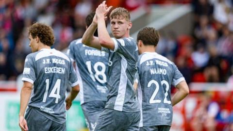 Dundee United's Zac Sapsford celebrates