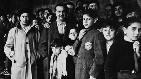 This file photo taken in 1942 shows Jewish deportees in the Drancy transit camp, their last stop before the German concentration camps