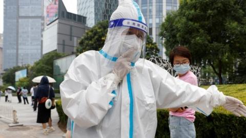 People queue to get tested in Beijing on Friday