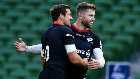 Saracens' Alex Goode celebrates with teammate Elliot Daly