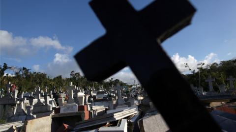 Graves destroyed during Hurricane Maria in September 2017