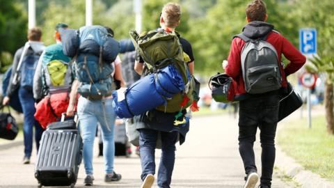 Festival goers leave Pinkpop in Landgraaf on 18 June