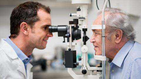 Older man getting an eye test