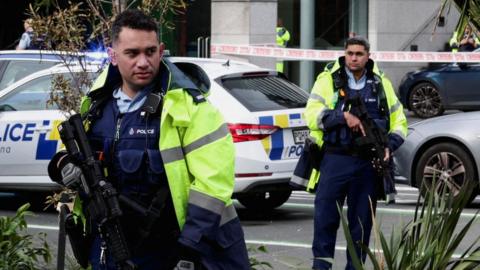 Policemen guard site of shooting in Auckland, New Zealand before Women's World Cup