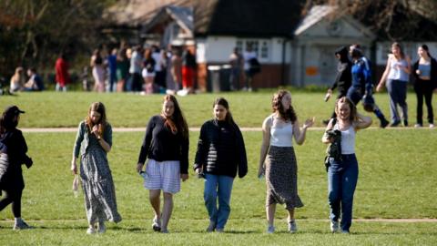 Young women in a park in London