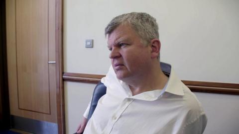 Adrian Chiles talking to the doctor