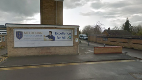 Exterior of Melbourn Village College and road leading to sports centre