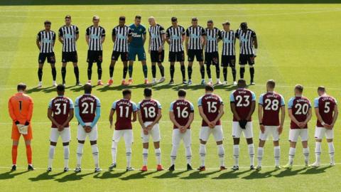 A minute's silence is held before the Premier League match between Newcastle and West Ham