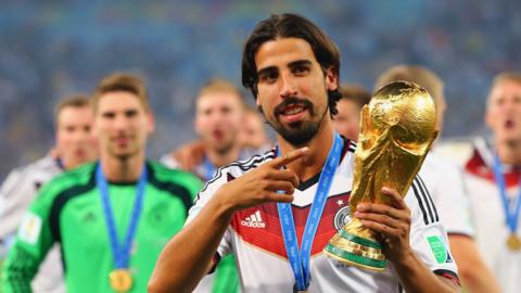 Sami Khedira with the World Cup trophy in 2014