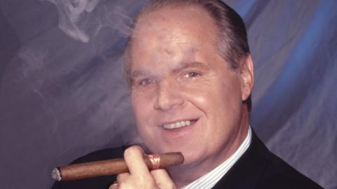 Rush Limbaugh smoking cigar