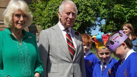 The King and Queen met eight year olds Camilla Nowawakowska and Charles Murray outside the cathedral