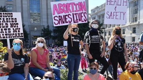 Protesters take part in the Women's March and Rally for Abortion Justice in Washington, DC, on October 2, 2021