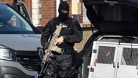 French anti-terror police on patrol in a street on Wattignies, northern France on 5 July