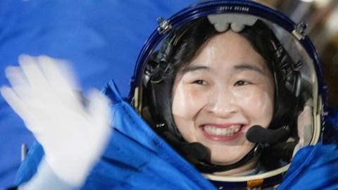Chinese astronaut Liu Yang waving
