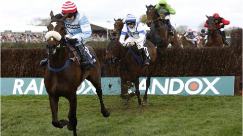 Cruz Control jumps a fence while leading the William Hill Handicap Chase