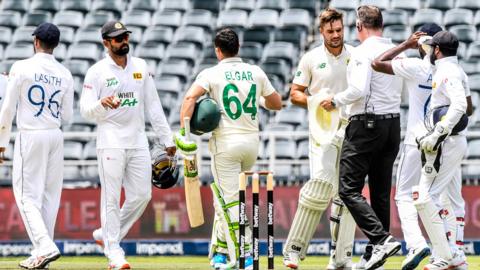 Sri Lanka congratulate South Africa's openers on their 10-wicket victory in the second Test