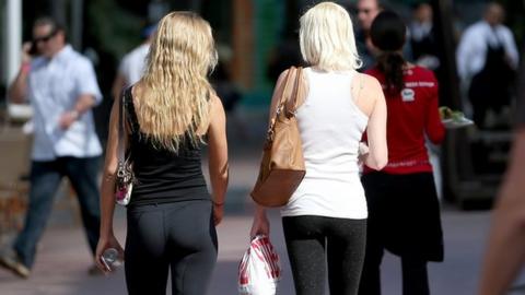 Women wearing leggings on the street