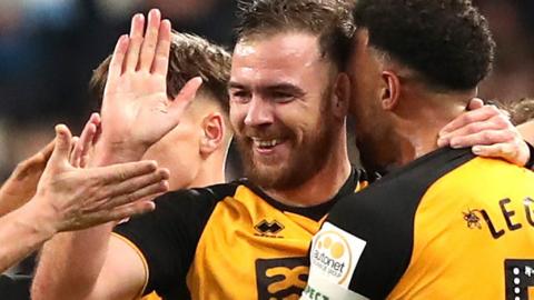 Port Vale's Tom Pope celebrates scoring against Manchester City