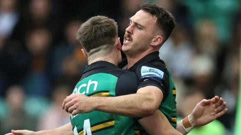 Tommy Freeman and Tom James celebrate a Northampton try against Sale