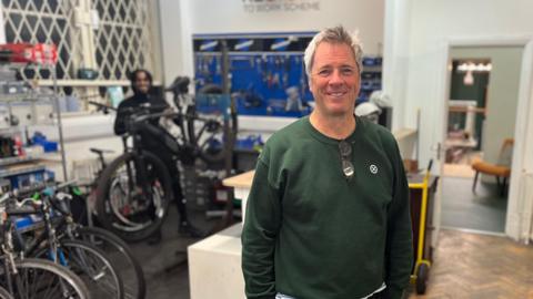 Stef Jones standing in one of the XO Bikes locations.