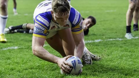 James McDonnell scores s try for Leeds against London