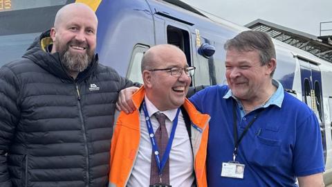 Train driver Bob Darlington and his colleagues