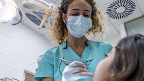 dentist-treating-young-girl.