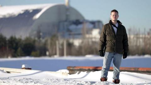 Jordan Dunbar infront of Chernobyl