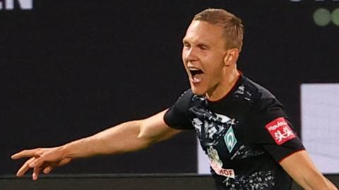 Werder Bremen's Ludwig Augustinsson celebrates scoring his side's second goal against Heidenheim