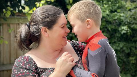 Kimberley Allison with son Logan who is wearing a Spiderman outfit