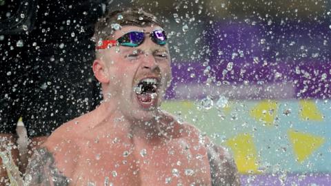 Adam Peaty shouting in celebration