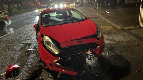 One of the damaged cars