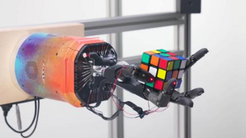 The robot hand took, on average, around four minutes to solve the Rubik's cube