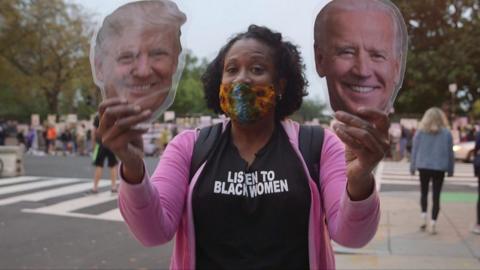 Voter with Trump and Biden faces