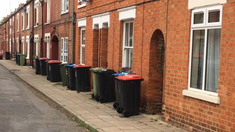 Wheelie bins on a street in New Bradwell