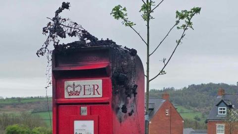 Postbox topper damaged by fire in Asker Lane, Matlock, Derbyshire