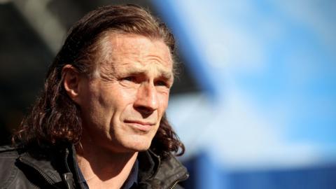 Gareth Ainsworth watches his QPR side against Watford